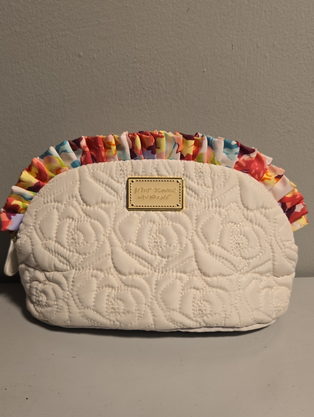 Betsey Johnson White Quilted Cosmetic Pouch with Multicolor Ruffle